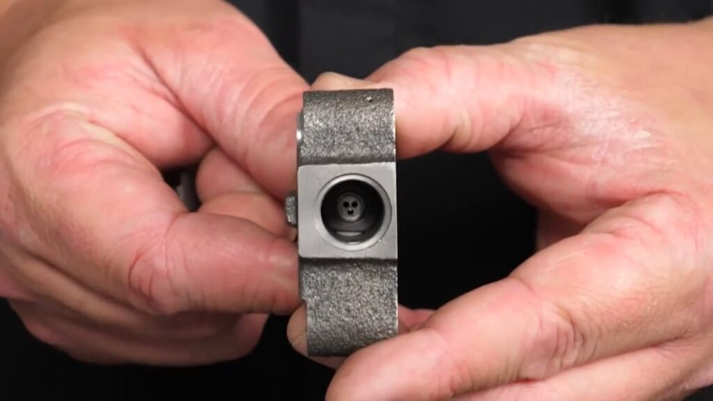engine rattle and timing guides: tensioner connection